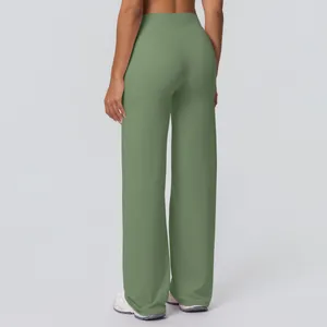 Rear view of high-waisted wide leg sage green yoga pants showing premium fabric texture
