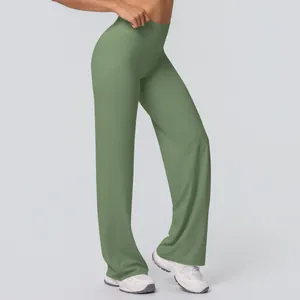 Detailed side view of high-waisted olive green flared yoga pants for women