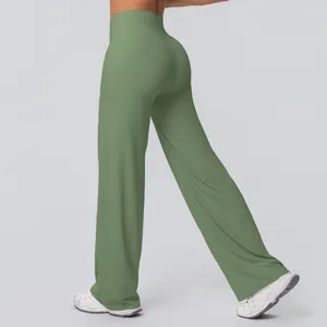 Side view of high waisted wide leg yoga pants in sage green with soft brushed fabric