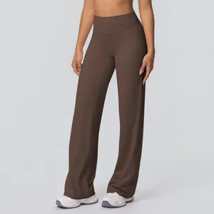 Detailed close-up of high-waisted wide leg yoga pants in deep chocolate brown fabric