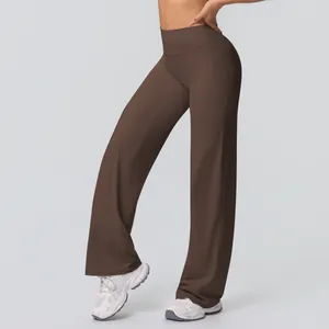 Close-up of high-waist dark brown wide-leg yoga pants with smooth elastic fabric