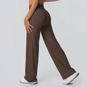 Side view of dark brown high-waisted wide-leg yoga pants with premium matte fabric