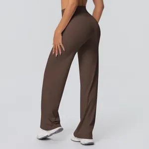 Detailed view of high waisted flared yoga pants in dark brown double brushed fabric