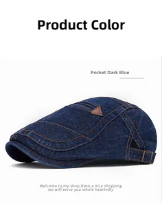 Détail d'un béret en denim bleu foncé avec coutures orange et petite poche décorative
