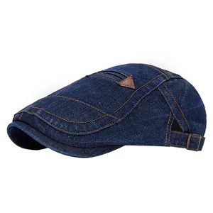 Béret rétro en denim bleu foncé avec coutures contrastées et boucle réglable