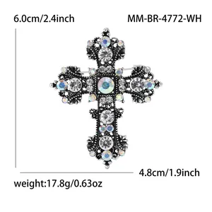 Vintage alloy cross brooch with crystal rhinestones showing dimensions 6.0cm x 4.8cm