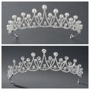 Close-up of bridal tiara featuring white pearls and shimmering crystal rhinestones