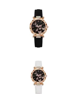 Dettaglio di orologi a farfalla in oro rosa con lunetta diamantata e cinturini in pelle nera o bianca
