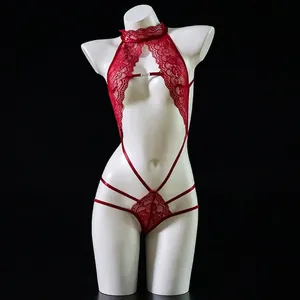 Detail of red lace teddy lingerie with halter neck and intricate floral patterns