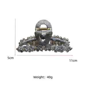 Detail view of 11cm large crystal hair claw clip with measurements and weight