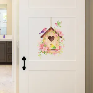 Pastel watercolor birdhouse wall sticker with pink cherry blossoms and small birds