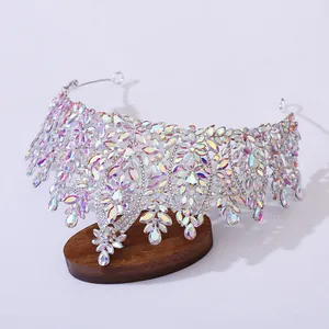 Macro detail of silver baroque bridal crown featuring iridescent AB crystal leaves
