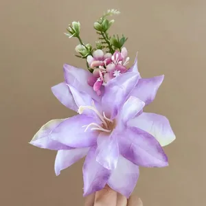 Elegant purple lily hair claw clip with gradient petals and small floral accents