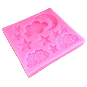 Pink silicone DIY mold featuring moon star and cloud shapes for cake and chocolate decorating