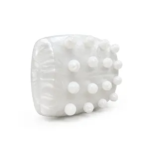 Elegant ivory marble textured massage comb with smooth resin acupressure points