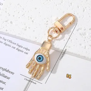 Detailed view of Hamsa Hand keychain with Evil Eye bead and dimensions shown