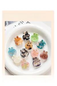 Detailed collection of colorful rabbit-shaped acetate hair claw clips in a ceramic bowl