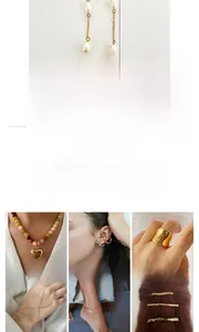 Macro detail of 18K gold-plated 316L stainless steel earrings with natural freshwater pearls