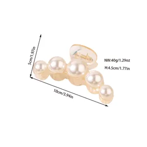 Detail view of pearl hair claw clip showing 10cm length and 40g weight dimensions