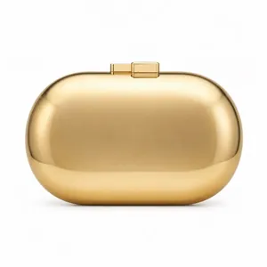 Pochette de soirée minimaliste en métal doré en forme de pilule avec fermoir