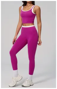 Detail of purple ribbed yoga set with white contrast trim on waist and neckline