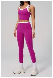 Detail of purple yoga set with white contrast trim and high-waist sports leggings