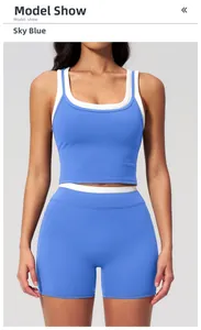 Close-up of sky blue high-waist yoga shorts with contrast white layering detail