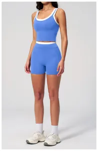 Blue ribbed yoga set detail showing racerback sports bra and high waist biker shorts