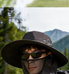 Detail of outdoor sun hat with breathable mesh face cover and dark grey brim