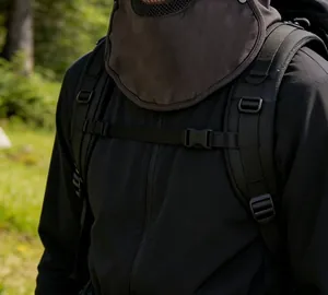Detail of outdoor sun protection set with mesh neck gaiter and breathable jacket