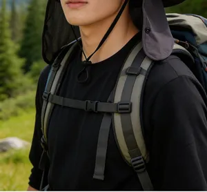 Detail of adjustable buckles and padded straps on a durable outdoor backpack and hat