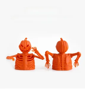 Front and back detail of orange pumpkin skeleton ornaments with clear plastic texture