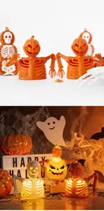 Detail of a glowing Halloween skeleton pumpkin decoration with movable joints and LED lights
