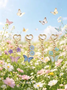 Detail of colorful butterfly and flower keychains with heart lobster clasps in nature