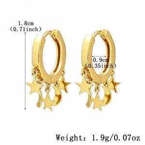 Detail view of gold S925 sterling silver hoop earrings with star and moon charms