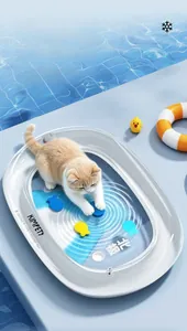 Detail of pet water mat showing floating toy fish and thick PVC material for cats