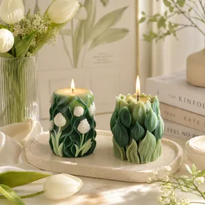 Cylindrical tulip scented candle with relief design and green flower bud candle