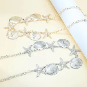 Détails de chaînes de taille en métal doré et argenté avec pendentifs étoile de mer