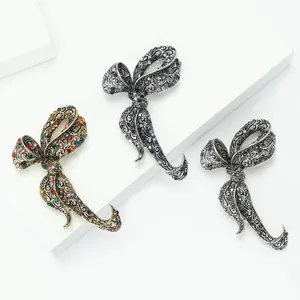 Luxury vintage bow brooches with colorful rhinestones in bronze silver and gunmetal