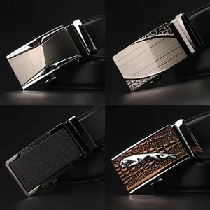 Detailed close-up of four luxury automatic belt buckles with diverse textures and designs
