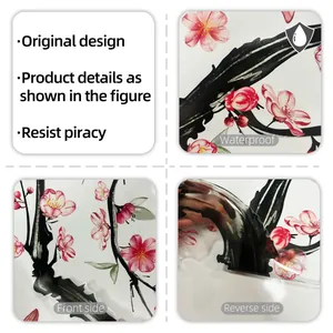 Detail of waterproof pink floral wall sticker showing front and back material texture