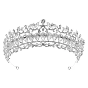 Elegant silver bridal crown with teardrop crystals and leafy rhinestone patterns