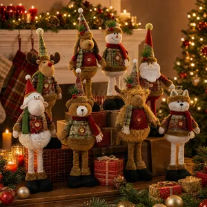 Detail of 8-piece plush Christmas doll set featuring Santa and reindeer in plaid outfits