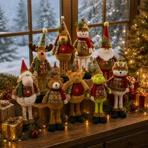 Group of plush Christmas dolls with festive plaid patterns on a cozy windowsill