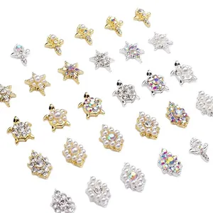 Japanese style gold and silver alloy nail art charms with sunflower and turtle designs
