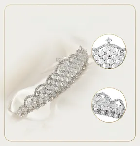 Detailed close-up showing the intricate alloy mesh and sparkling crystal beadwork on silver tiara