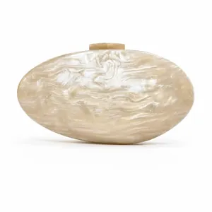Oval ivory marble acrylic clutch bag with elegant golden metal clasp for women