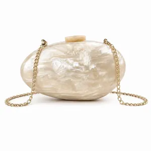 Elegant marble pattern oval acrylic clutch bag with a golden metal chain strap