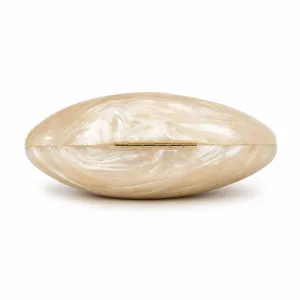 Elegant oval acrylic evening clutch with marble texture and golden metal hinge details
