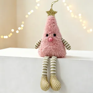 Detailed view of pink plush Christmas tree doll with long legs and gold star detail